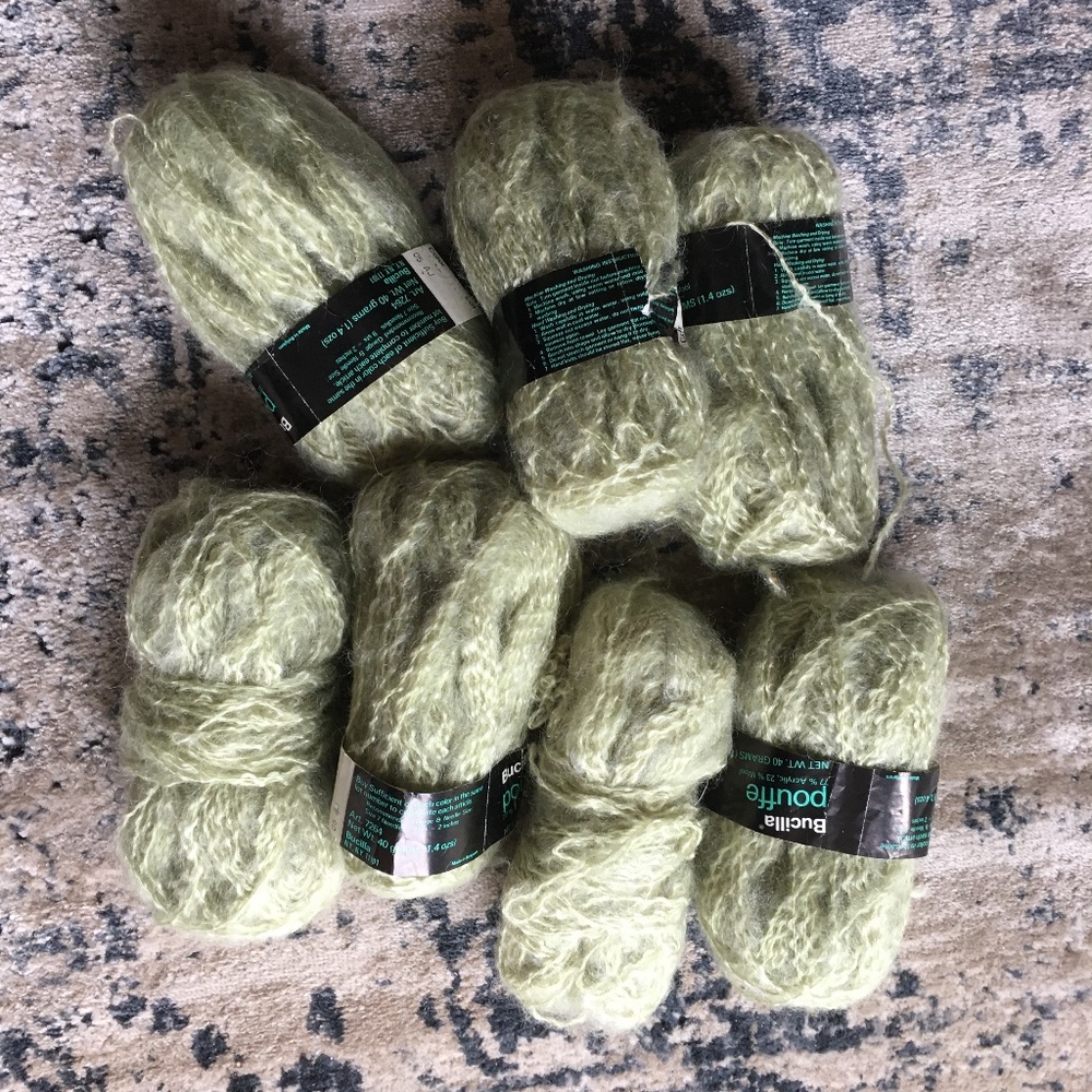 Seven skeins of Bucilla Pouffe, 77% Acrylic, 23% wool.